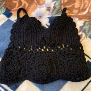 Crocheted crop top fits (S-M) color back
